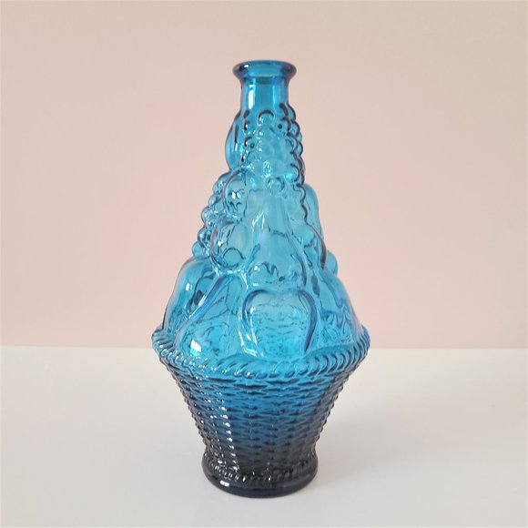 blue glass bottle Other - Blue Embossed Glass Bottle.